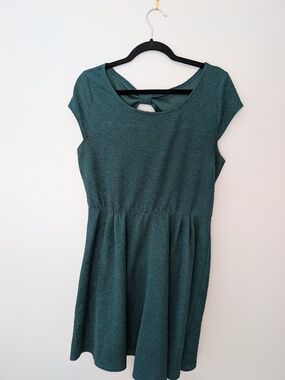 Super cute dark green dress with peekaboo back